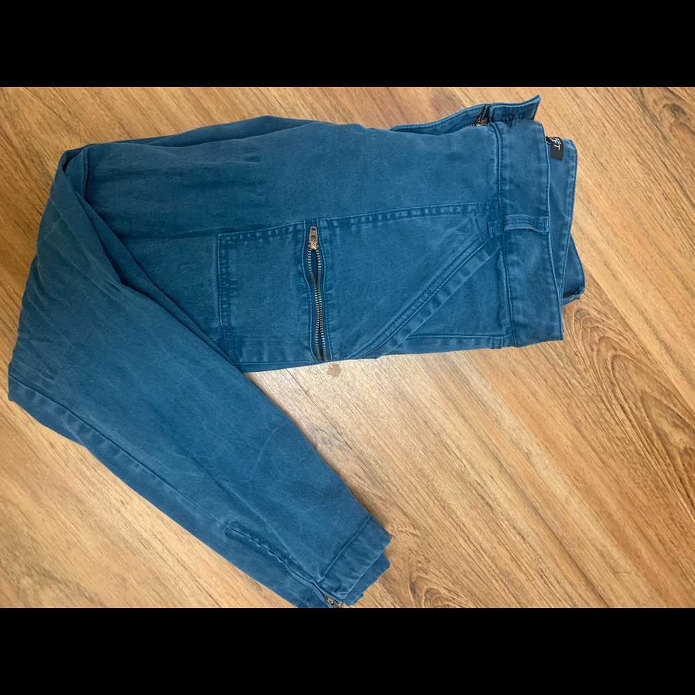 Blue LOFT pants, with zippered pocket embellishments